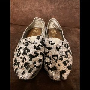 Tom’s sparkly shoes
